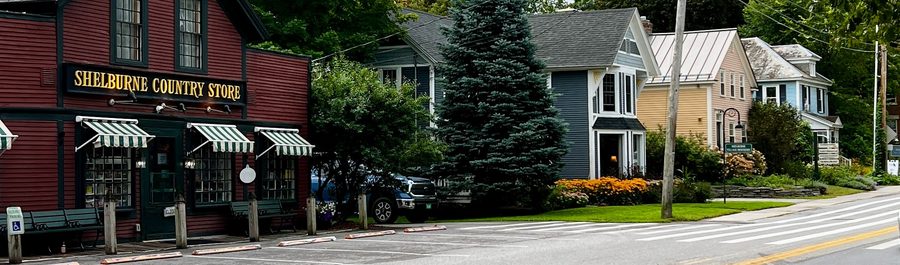 The historic village streetscape — Falls Road or the Shelburne Country Store block, the area a Step Three designation would cover
